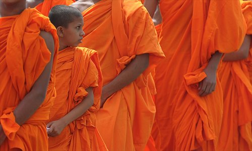 Sri Lankan Buddhist monks protest outside the Indian High Commission in Colombo on Tuesday. The monks demanded that India stop its alleged anti-Sri Lanka stance by supporting Tamil separatists among the island's ethnic Tamil minority. Photo: AFP
