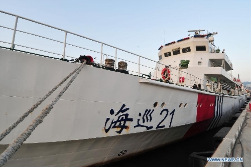 Patrol vessel Haixun 21 arrives at a port in Sanya, south China's Hainan Province, Jan. 17, 2013, after finishing a three-day patrol in the South China Sea. (Xinhua/Hou Jiansen) 