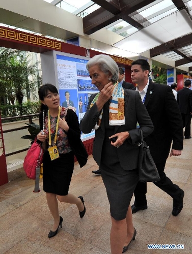 Managing Director of the International Monetary Fund (IMF) Christine Lagarde walks into the conference hall prior to the opening ceremony of the Boao Forum for Asia (BFA) Annual Conference 2013 in Boao, south China's Hainan Province, April 7, 2013. (Xinhua/Jiang Enyu)