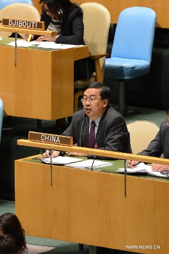 Wang Min, China's deputy permanent representative to the UN, speaks during a meeting on the Arms Trade Treaty at the UN headquarters in New York, April 2, 2013. The UN General Assembly on Tuesday voted to adopt the Arms Trade Treaty, which regulates the multi-billion-U.S. dollar international arms trade. The treaty was adopted by a vote of 154 to 3, with 23 countries abstaining from the vote. The Democratic People's Republic of Korea (DPRK), Iran and Syria voted against the treaty. (Xinhua/Niu Xiaolei) 