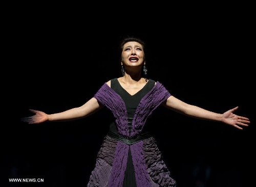 Actress Jiang Shan performs during the stage drama 