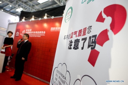 An exhibitor introduces products for removing air pollution inside vehicles at the 16th China International Expo for Auto Electronics, Accessories, Tuning & Car Care Products (CIAACE 2013) in Beijing, capital of China, March 3, 2013. The four-day CIAACE 2013 kicked off on March 1 in Beijing. (Xinhua/Zheng Huansong)&nbsp; 