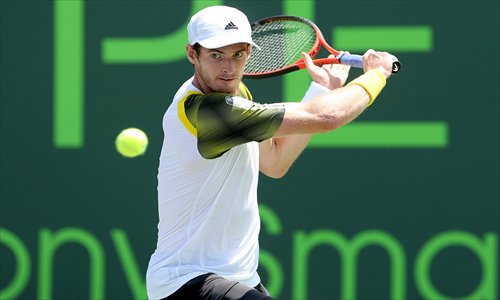 Andy Murray of Great Britain returns a shot to David Ferrer of Spain during the final of the Sony Open at Crandon Park Tennis Center in Key Biscayne, Florida on Sunday. Photo: AFP