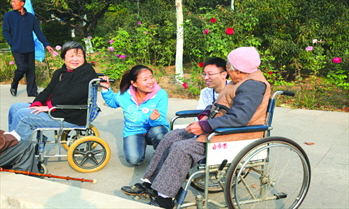 Volunteers with residents of the Sijiqing Homes for the Elderly in the Haidan district Photo: Courtesy of New Path Foundation 