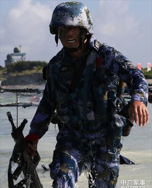 A solider successfully lands during a PLA military training competition held on the Xisha Islands in the South China Sea on December 5. Photo: mil.cnr.cn