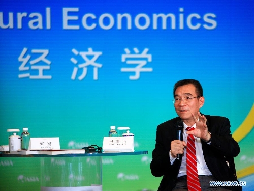 Former Chief Economist and Senior Vice President of the World Bank Lin Yifu, who is also the honorary director of the National School of Development of Peking University, speaks on a Boao Dialogue on new structural economics during an annual meeting of the Boao Forum for Asia in Boao, south China's Hainan Province, April 6, 2013. (Xinhua/Xu Zijian) 