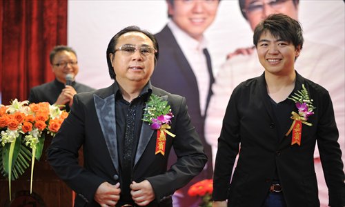 Lang Lang (right) with his father Lang Guoren
