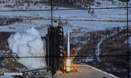 Photo released by the official KCNA news agency of the Democratic People's Republic of Korea (DPRK) on December 12, 2012 shows the Unha-3 carrier rocket launching with the satellite Kwangmyongsong-3, on a monitor screen at the satellite control center. According to the KCNA, the second version of Kwangmyongsong-3 was launched by an Unha-3 carrier rocket at 9:49 a.m. local time (0049 GMT) Wednesday from the Sohae Space Center in Cholsan County, North Phyongan Province, and entered the preset orbit. Photo: Xinhua