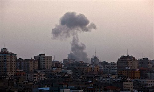 Smoke rises after an Israeli airstrike in Gaza City, on November 17, 2012. 40 Palestinians were killed in a series of Israeli airstrikes on the Gaza Strip since Wednesday.Photo; Xinhua