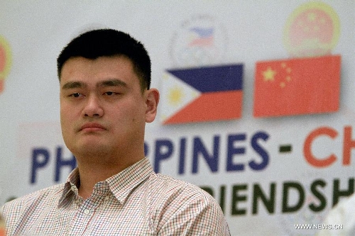 Former Chinese basketball superstar Yao Ming attends a press conference in Pasig City, the Philippines, May 5, 2013. Yao and his Shanghai Sharks are in Manila on a friendly visit. They will attend two exhibition games respectively with the Smart Gilas Team and the Philippine Basketball Association (PBA) Selection. (Xinhua/Rouelle Umali) 