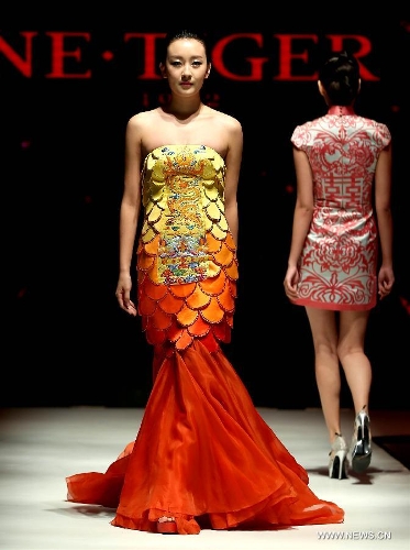 A model presents a creation by Chinese designer Zhang 