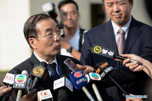 &nbsp;Chinese Ambassador to Egypt Song Aiguo (L) receives interview about the hot air balloon crash in Cairo, Egypt, on Feb. 27, 2013. A Chinese Foreign Ministry work panel arrived in Egypt on Wednesday to deal with the aftermath of a deadly hot air balloon crash, in the wake of nine Hong Kong tourists that died in the tragedy in the country. (Xinhua/Li Muzi) 