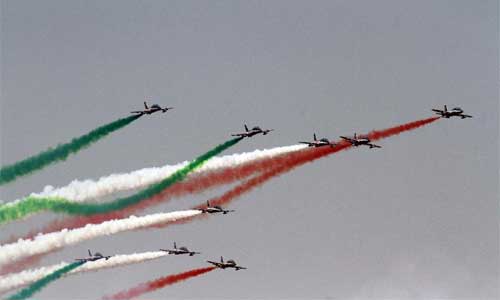 Italian team Frecce Tricolori performs at the Bucharest International Air Show & General Aviation Exhibition (BIAS 2012) at the Bucharest Baneasa-Aurel Vlaicu International Airport in Bucharest, capital of Romania, July 21, 2012. The Bucharest Baneasa Airport is celebrating its 100th anniversary of aviation and it brings for the first time in Bucharest, two of the most famous aerobatics teams in the world: Frecce Tricolori (Italy) and Turkish Stars (Turkey). Photo: Xinhua