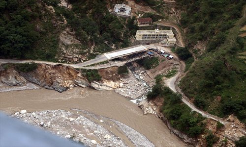 A handout photo made available by the Indian Army on June 24 shows an aerial view of the destruction caused by the floods in the Guptkashi area of the Kedarnath valley in Uttrakhand, India. Photo: CFP