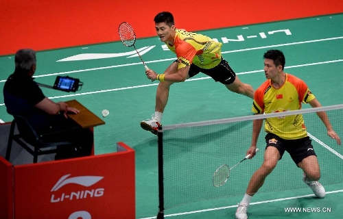 Cai Yun and Fu Haifeng (Rear) of China compete during the 2013 Sudirman Cup world mixed team badminton championship against Indonesia's Hendra Setiawan and Angga Pratama in Kuala Lumpur, Malaysia, on May 21, 2013. The Chinese pair won 2-1. (Xinhua/Chen Xiaowei) 
