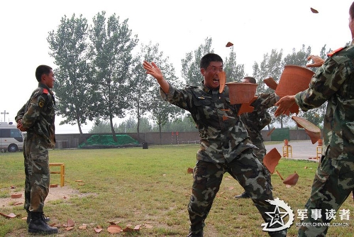 The Tai'an Detachment of the Chinese People's Armed Police Force (APF) organized 30 special operation members to conduct a military skills training, in a bid to further enhance their combat capability in complex environment. They completed many training subjects, such as the special tactics, precision shooting, hard qigong and anti-hijacking force assault. Although their average age is only 20 years old, they have undertaken the security work for several major events. (Photo: China Military Online/People's Daily Online)  