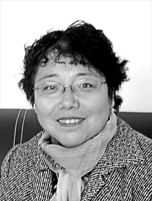 Wang Chunhuan (Wang), deputy director of the Theoretical Marxism Institute with the Tibet Autonomous Region Academy of Social Sciences (TARASS)