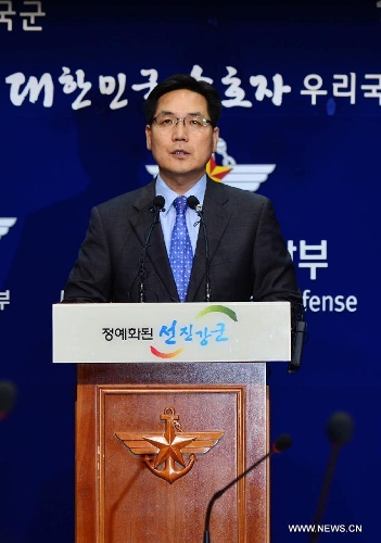 South Korean Defense Ministry spokesman Kim Min-suk speaks during a press conference in Seoul, South Korea, May 18, 2013. The Democratic People's Republic of Korea (DPRK) on Saturday launched three short-range guided missiles into the Sea of Japan, Yonhap News Agency reported, citing South Korea's defense ministry. (Xinhua/NEWSIS)