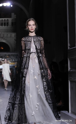 A model displays creations of Valentino during Valentino's Spring/Summer 2013 Haute Couture fashion show in Paris, France, Jan. 23, 2013. (Xinhua/Gao Jing) 