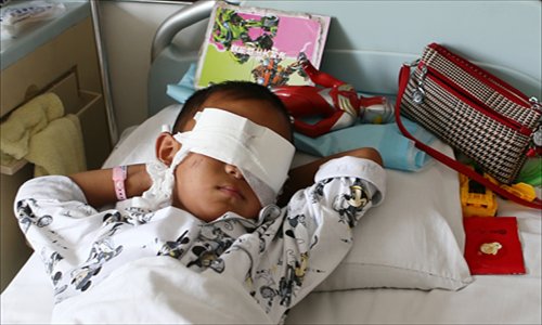 The 6-year-old boy, whose eyes were gouged out by a suspect still at large, is undergoing treatment at a local hospital in Taiyuan, Shanxi Province on Tuesday. Photo: CFP