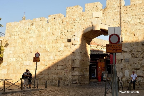 This photo taken on July 3, 2013 shows the New Gate of Jerusalem's Old City. Old City of Jerusalem and its Walls were recorded on the United Nations Educational, Scientific and Cultural Organization's World Heritage list in 1982. (Xinhua/ Yin Dongxun)
