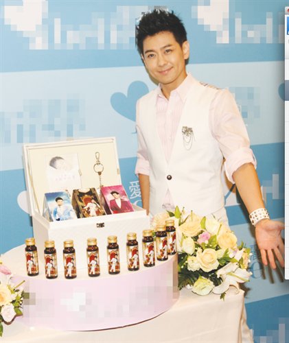 Lin Chih-ying, also known as Jimmy Lin, poses in front of his company's collagen products in an event in Shanghai in October. Photo: CFP
