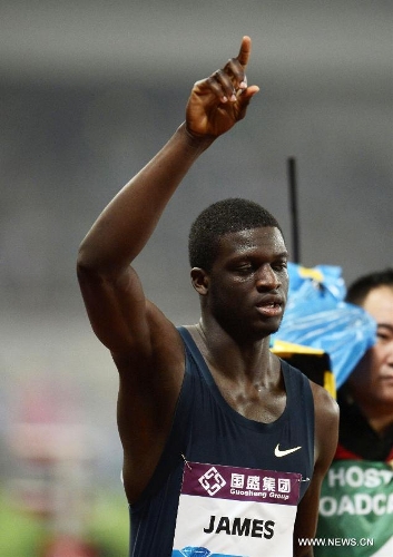 Grenada's Kirani James reacts after winning the men's 400 meters race during the IAAF Diamond League Athletics meet in Shanghai, east China, May 18, 2013. Kirani James won the first place of the event in 44.02 seconds.(Xinhua/Li Jundong) 