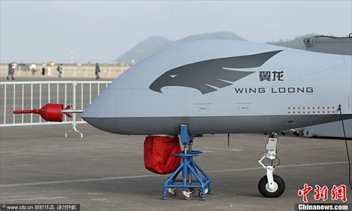 The unmanned plane Wing Loong, designed by the Aviation Industry Corporation of China (AVIC), is exhibited at the Airshow China 2012 in Zhuhai, Guangdong Province on Monday. The show, now in its ninth year, runs until November 18. Photo: CFP