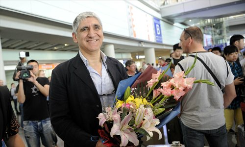 1Panagiotis Giannakis, the new head coach of the China men's basketball team, arrives at the Beijing Capital International Airport in Beijing on Tuesday. Nicknamed 