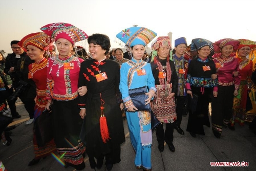Deputies to the 12th National People's Congress (NPC) arrive at the Tian'anmen Square in Beijing, capital of China, March 5, 2013. The first session of the 12th National People's Congress (NPC) will open at the Great Hall of the People in Beijing on March 5. (Xinhua/Chen Shugen)