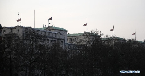 The Union Flags fly at half mast over government buildings following the death of former British Prime Minister Baroness Margaret Thatcher in London, Britain, on April 8, 2013. It has been confirmed that Lady Thatcher died this morning following a stroke at the age of 87. (Xinhua/Wang Lili) 