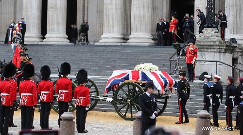 The coffin of British former prime minister Margaret Thatcher is transported to St Paul's Cathedral in London, Britain, April 17, 2013. The funeral of Margaret Thatcher, the first female British prime minister, started 11 a.m. local time on Wednesday in London. (Xinhua/Yin Gang) Related:London bids farewell to 
