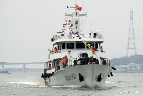 Chinese fishery patrol ship 44608 enters the bay in Shantou, south China's Guangdong Province, March 30, 2013. The patrol ship 44608 finished its 23-day patrol cruise around Huangyan Islands on Saturday and returned to Shantou. (Xinhua/Yao Jun) 
