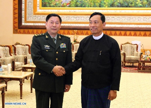 Speaker of the House of Representatives of Myanmar U Shwe Mann (R) shakes hands with visiting Deputy Chief of General Staff of the Chinese People's Liberation Army Qi Jianguo in Nay Pyi Taw, capital of Myanmar, on Jan. 20, 2013. Qi jianguo arrived here Saturday for the first China-Myanmar strategic security consultation. (Xinhua/U Aung) 