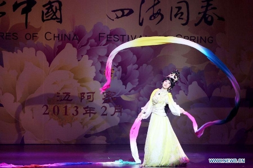 Beijing Opera performer Ding Xiaojun dances during the 