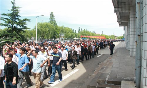 Workers at Cooper Chengshan protest against the deal. Photo: Courtesy of CCT's labor union 