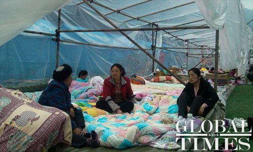 Baoxing quake victims rest in temporary tents on April 23. Photo: Liang Chen/GT