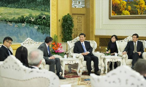 Chinese President Xi Jinping (3rd R) meets with US Treasury Secretary Jacob Lew (4th R) in Beijing, capital of China, March 19, 2013. Photo: Xinhua/Li Xueren