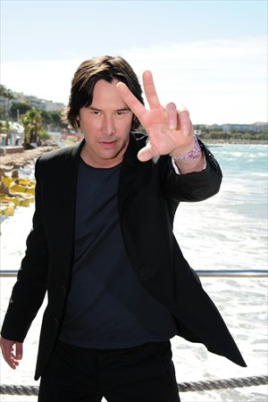 Keanu Reeves attends the photo call for Man of Tai Chi at this year's ongoing Cannes Film Festival. Photos: IC