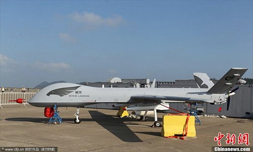 The unmanned plane Wing Loong, designed by the Aviation Industry Corporation of China (AVIC), is exhibited at the Airshow China 2012 in Zhuhai, Guangdong Province on Monday. The show, now in its ninth year, runs until November 18. Photo: CFP