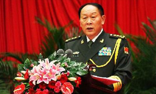 Chinese Defense Minister Liang Guanglie addresses a grand reception to mark the 85th anniversary of the founding of the People's Liberation Army (PLA) at the Great Hall of the People in Beijing, capital of China, July 31, 2012. Photo: Xinhua