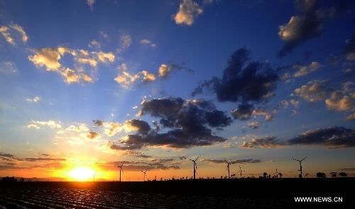 File photo taken on June 12, 2012 shows a scene of the Xiaowutai Photovoltaic Plant in Youyu County, north China's Shanxi Province. According to the latest data released by the state energy administration, China has become the world's largest energy producer by the end of 2012. The total installed electricity capacity was 1.14 billion kilowatts, including 249 million of hydropower capacity which was the world's largest. The installed wind power capacity stood at 63 million kilowatts, making China the world's No. 1 in this field. The nuclear power under construction is also the world's largest. (Xinhua/Yan Yan)&nbsp; 