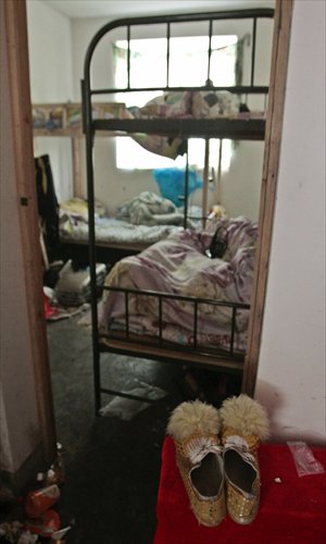 Deng Jianwen's lion dance performers live in this 80-square-meter apartment in Pudong, Shanghai. Photo: CFP