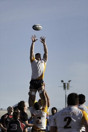 Cyprus' national rugby union team player Marko Mladenovic catches the ball in a line-out during their European Nations Cup match against Austria on November 30 at the Pafiako Stadium in the coastal resort of Paphos, Cyprus. Photo: CFP
