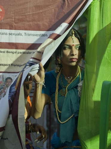 An Indian transgender watches dance performance in Calcutta, capital of eastern Indian state West Bengal, April 30, 2013. Several transgender and sex worker associations participated in an awareness program to encourage their acceptance in society. (Xinhua/Tumpa Mondal) 