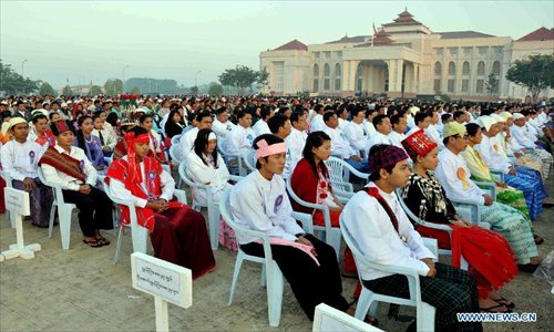 People attend a ceremony marking the 65th Anniversary of Myanmar's independence in Nay Pyi Taw, Myanmar, January 4, 2013.