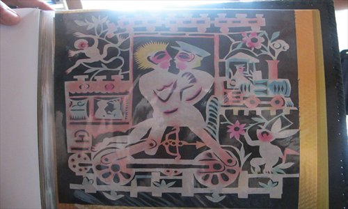 A paper cutting showing a romantic encounter.