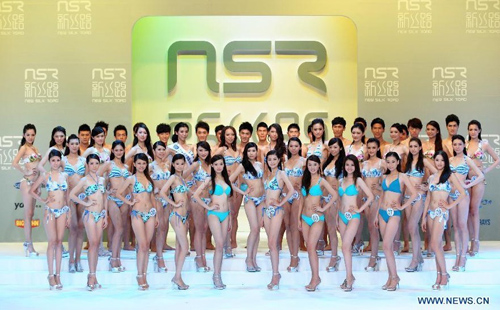 Contestants take part in the 2012 New Silk Road Taiwan Model Contest in Taipei, Southeast China's Taiwan, August 25, 2012. Forty-nine models competed for crowns in Saturday's contest. The winners will be qualified for the 2012 New Silk Road World Model Contest. Photo: Xinhua