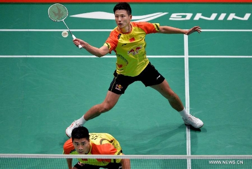 Cai Yun (Rear) and Fu Haifeng of China compete during the 2013 Sudirman Cup world mixed team badminton championship against Indonesia's Hendra Setiawan and Angga Pratama in Kuala Lumpur, Malaysia, on May 21, 2013. The Chinese pair won 2-1. (Xinhua/Chen Xiaowei) 