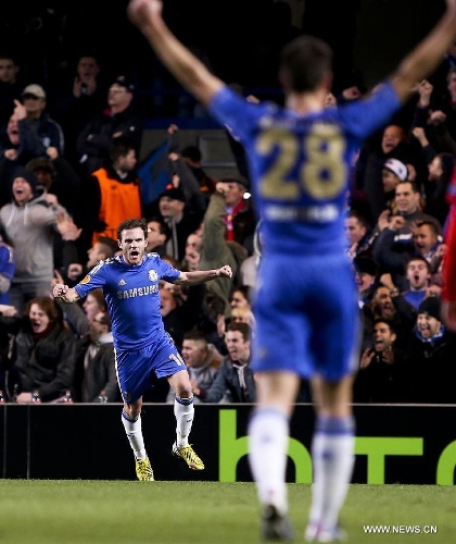 Chelsea's Juan Mata (L) celebrates during their Europa League soccer match against Steaua Bucharest in London March 15, 2013. Chelsea won 3-1 and entered the next round by 3-2 on aggregate. (Xinhua/Tang Shi) 